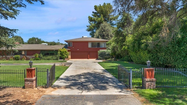 5481 E Geary St, Fresno, CA 93727 - view of front facade with a garage and concrete driveway