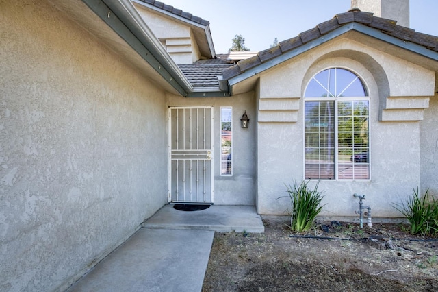 9340 N Jackson Ave, Fresno, CA 93720 - property entrance with stucco siding