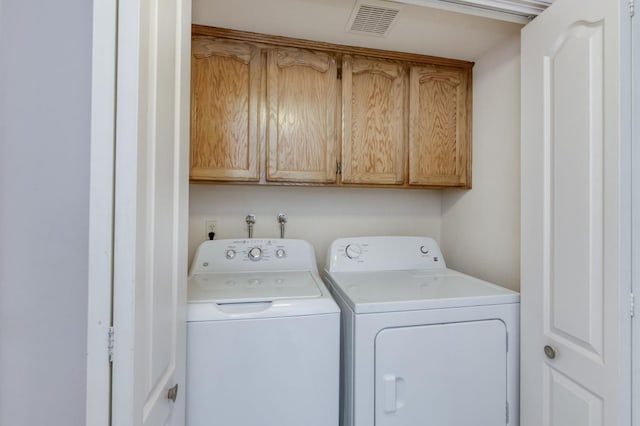 9340 N Jackson Ave, Fresno, CA 93720 - laundry room featuring washing machine and clothes dryer and cabinet space