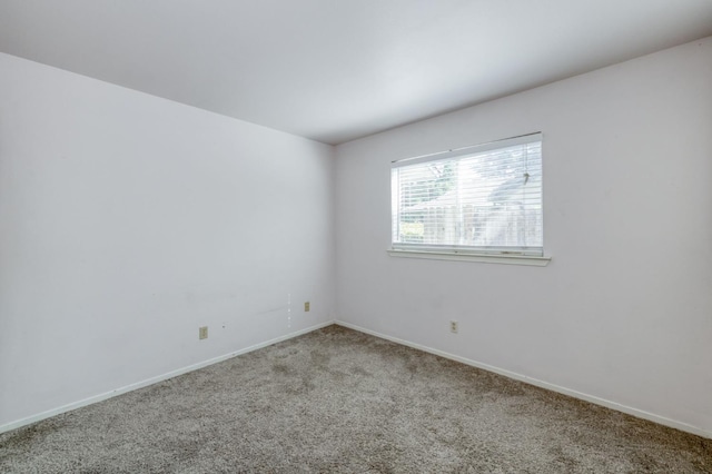 9340 N Jackson Ave, Fresno, CA 93720 - empty room featuring carpet floors and baseboards