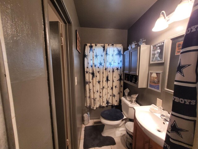 full bathroom with a shower with shower curtain and tile patterned floors