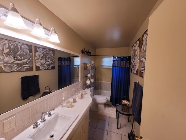 full bath with vanity, tile patterned flooring, shower / bathtub combination with curtain, and vaulted ceiling