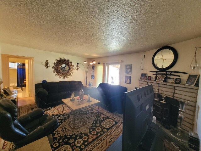 living room featuring a textured ceiling