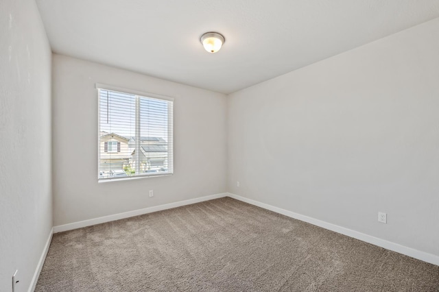 834 Amanecer Ave, Clovis, CA 93619 - carpeted spare room with baseboards