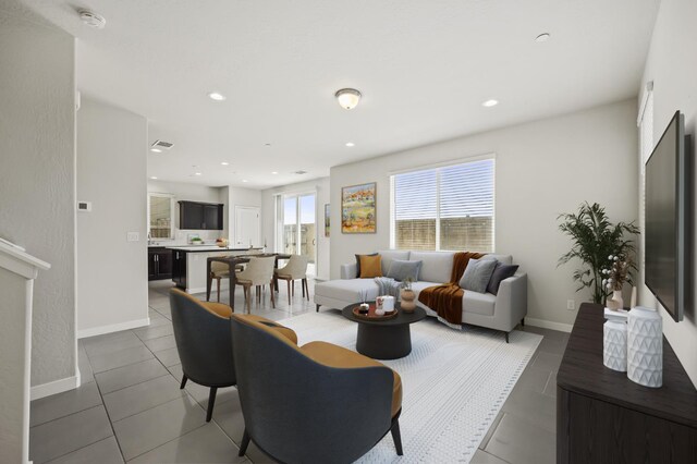 834 Amanecer Ave, Clovis, CA 93619 - living area with tile patterned floors and recessed lighting