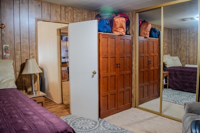 371 Bethel Ave Unit 62, Sanger, CA 93657 - bedroom with wood walls and carpet floors