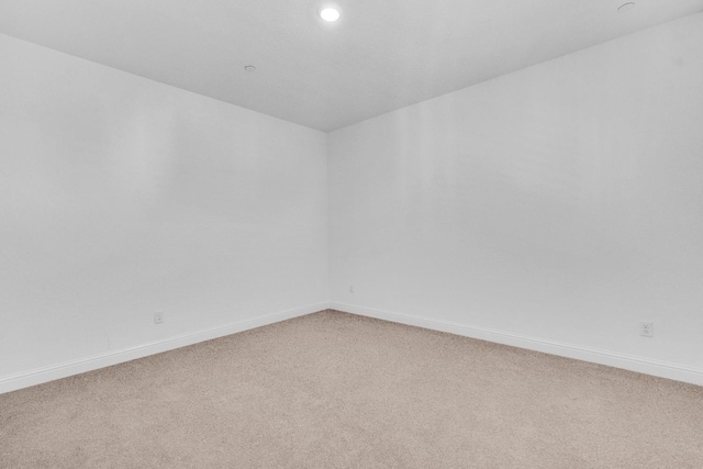 6569 E Lyell Ave, Fresno, CA 93727 - empty room featuring light carpet and recessed lighting