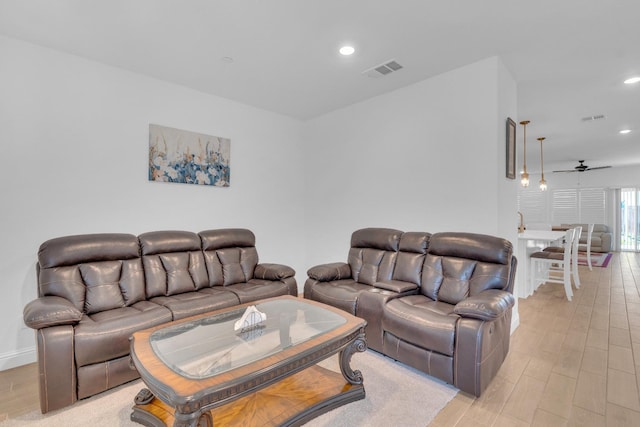 6569 E Lyell Ave, Fresno, CA 93727 - living room featuring recessed lighting, light wood-style floors, and ceiling fan