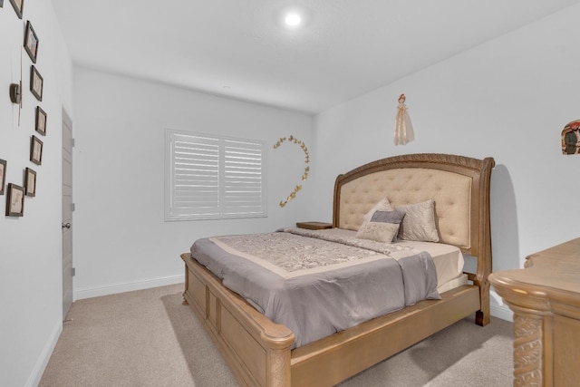 6569 E Lyell Ave, Fresno, CA 93727 - bedroom with light carpet and baseboards
