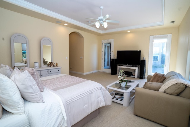 1622 E Shadow Crk, Fresno, CA 93730 - bedroom with light carpet, a tray ceiling, arched walkways, ornamental molding, and a ceiling fan