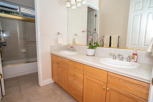 1622 E Shadow Crk, Fresno, CA 93730 - bathroom featuring double vanity, tile patterned flooring, and shower / washtub combination
