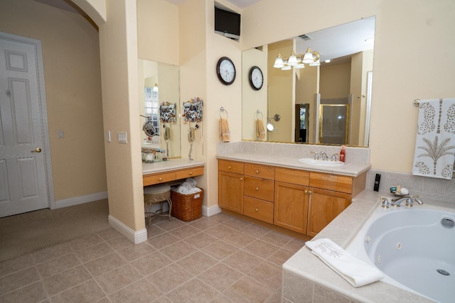 1622 E Shadow Crk, Fresno, CA 93730 - full bathroom featuring a tub with jets, vanity, and a shower stall