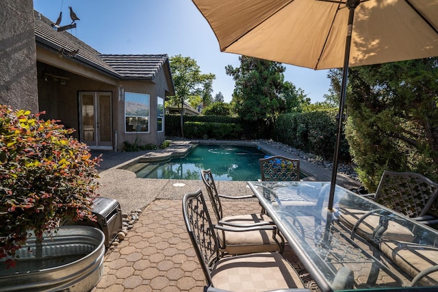 1622 E Shadow Crk, Fresno, CA 93730 - view of swimming pool featuring a patio area, french doors, outdoor dining area, and a fenced backyard