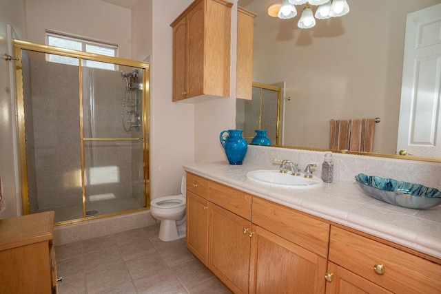 1622 E Shadow Crk, Fresno, CA 93730 - full bath with vanity, a shower stall, tile patterned flooring, and a chandelier