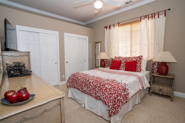 1622 E Shadow Crk, Fresno, CA 93730 - bedroom with ornamental molding, two closets, light carpet, and a ceiling fan
