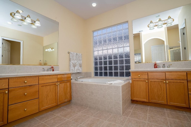 1622 E Shadow Crk, Fresno, CA 93730 - bathroom with vanity, a garden tub, tile patterned floors, and a shower stall