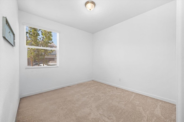 6105 W Richert Ave, Fresno, CA 93723 - carpeted spare room with baseboards