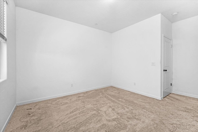 6105 W Richert Ave, Fresno, CA 93723 - empty room with carpet and baseboards