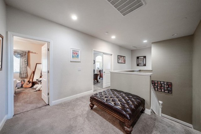 6712 W Lucas Dr, Fresno, CA 93722 - hallway with an upstairs landing, light carpet, and recessed lighting