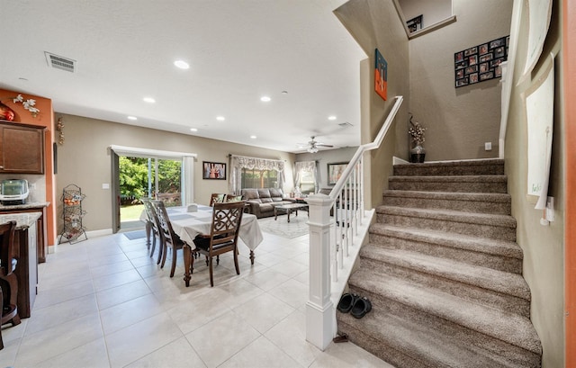 6712 W Lucas Dr, Fresno, CA 93722 - dining area with recessed lighting, stairs, a ceiling fan, and light tile patterned floors