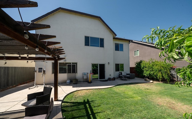 6712 W Lucas Dr, Fresno, CA 93722 - back of house with stucco siding, a patio, and a pergola