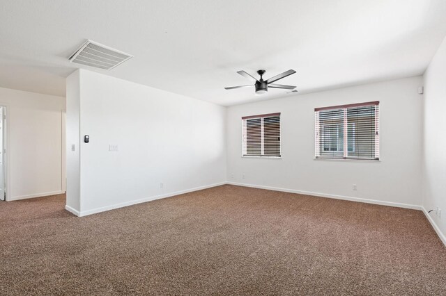 5227 E Florence Ave, Fresno, CA 93727 - empty room with carpet floors and a ceiling fan