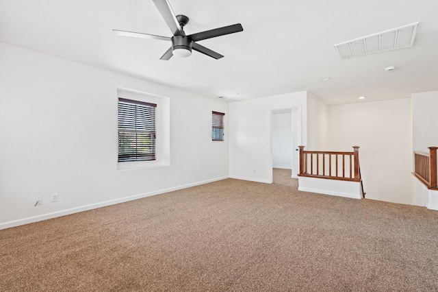 5227 E Florence Ave, Fresno, CA 93727 - carpeted spare room with baseboards and ceiling fan