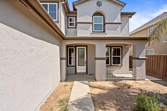 5227 E Florence Ave, Fresno, CA 93727 - property entrance featuring a porch and stucco siding