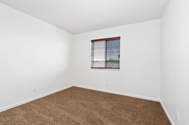 5227 E Florence Ave, Fresno, CA 93727 - empty room featuring carpet floors and baseboards