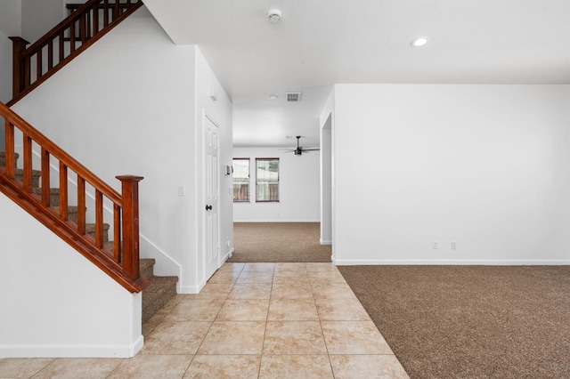 5227 E Florence Ave, Fresno, CA 93727 - entryway with carpet, a ceiling fan, stairway, recessed lighting, and tile patterned floors