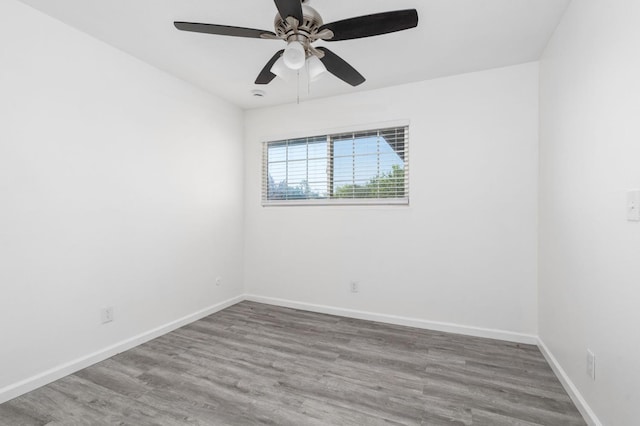 1428 N Knoll Ave, Fresno, CA 93722 - unfurnished room featuring wood finished floors and ceiling fan