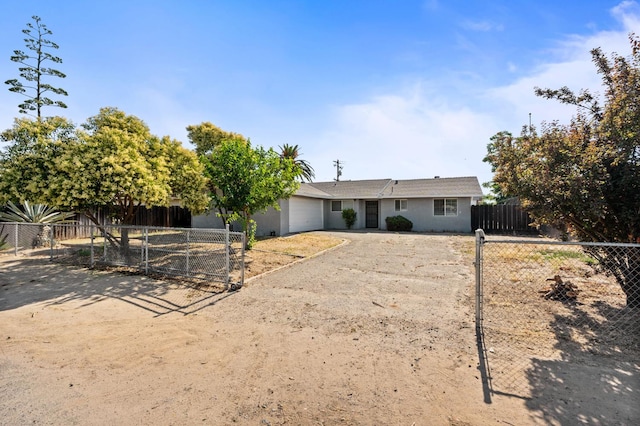1428 N Knoll Ave, Fresno, CA 93722 - ranch-style home with driveway, a garage, and a gate