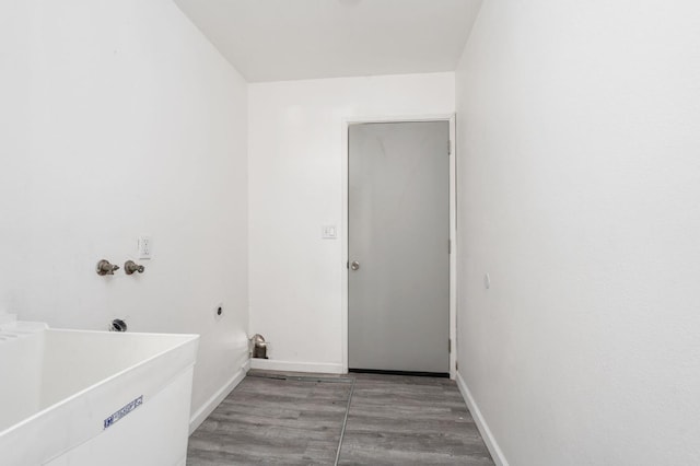 1428 N Knoll Ave, Fresno, CA 93722 - laundry area featuring light wood finished floors and hookup for a washing machine