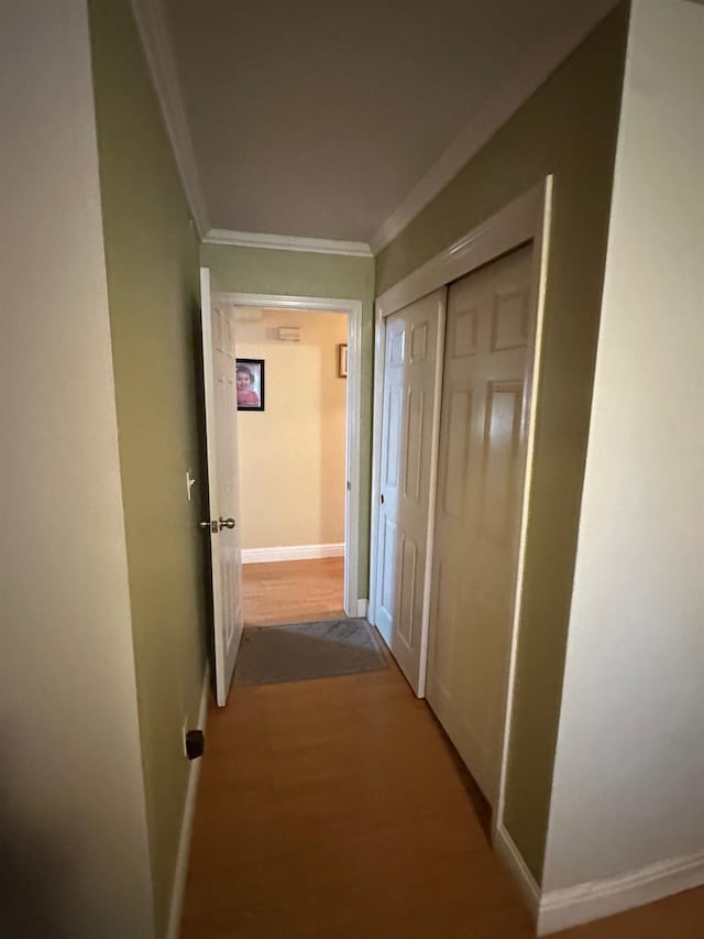 6675 N Lola Ave, Fresno, CA 93722 - hallway with crown molding and wood finished floors