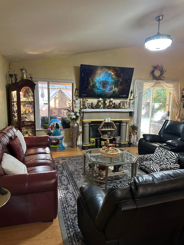 6675 N Lola Ave, Fresno, CA 93722 - living area with wood finished floors and vaulted ceiling