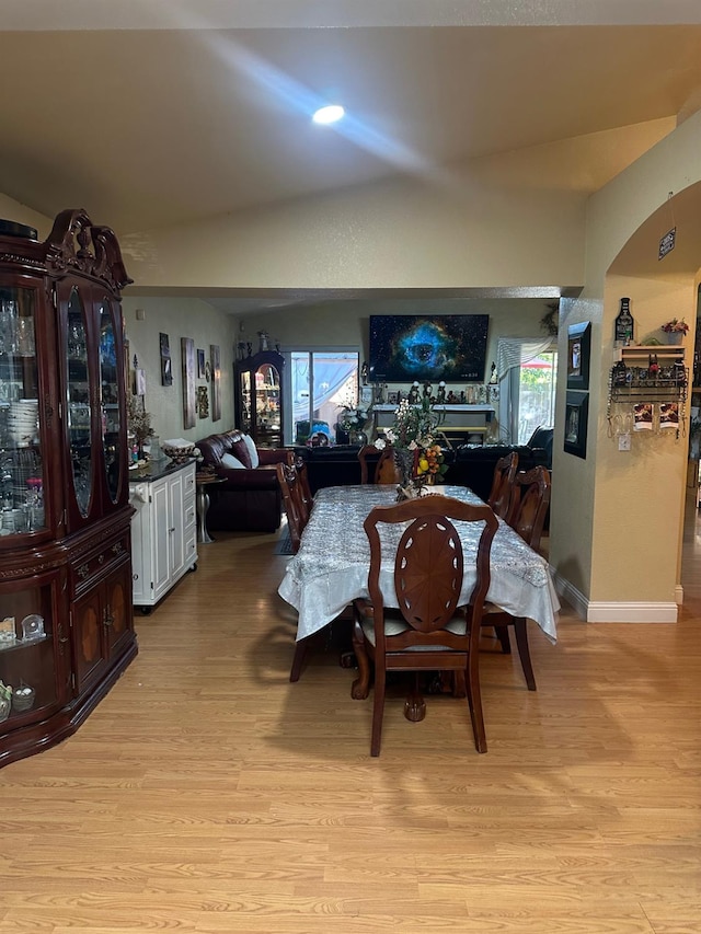 6675 N Lola Ave, Fresno, CA 93722 - dining room with light wood-style floors and baseboards