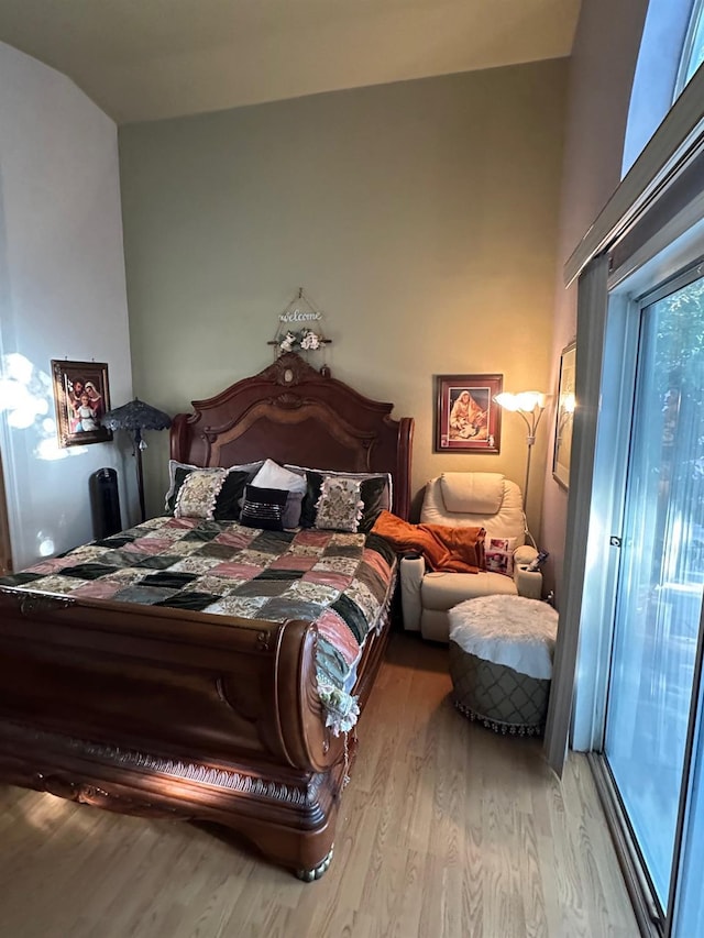 6675 N Lola Ave, Fresno, CA 93722 - bedroom featuring wood finished floors