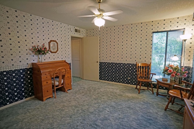 5513 N El Adobe Dr, Fresno, CA 93711 - sitting room featuring wallpapered walls, a ceiling fan, and carpet