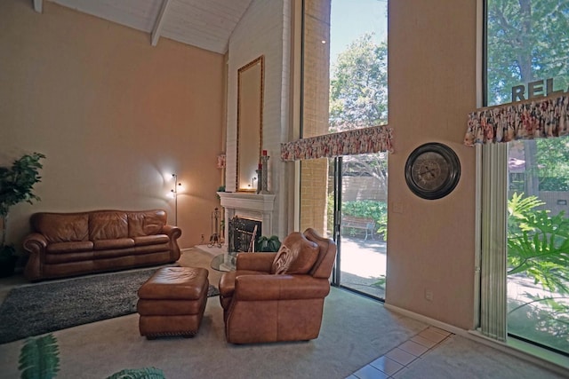 5513 N El Adobe Dr, Fresno, CA 93711 - carpeted living area featuring high vaulted ceiling, healthy amount of natural light, and a fireplace