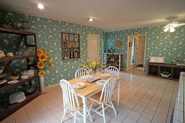 5513 N El Adobe Dr, Fresno, CA 93711 - dining space with tile patterned flooring, wallpapered walls, and a ceiling fan