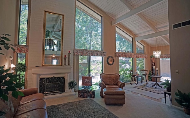 5513 N El Adobe Dr, Fresno, CA 93711 - living room featuring high vaulted ceiling, a chandelier, a fireplace, and a wood ceiling with exposed beams