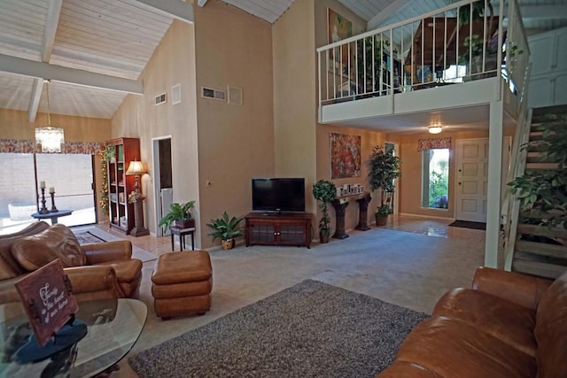 5513 N El Adobe Dr, Fresno, CA 93711 - carpeted living room featuring high vaulted ceiling, a chandelier, and beamed ceiling