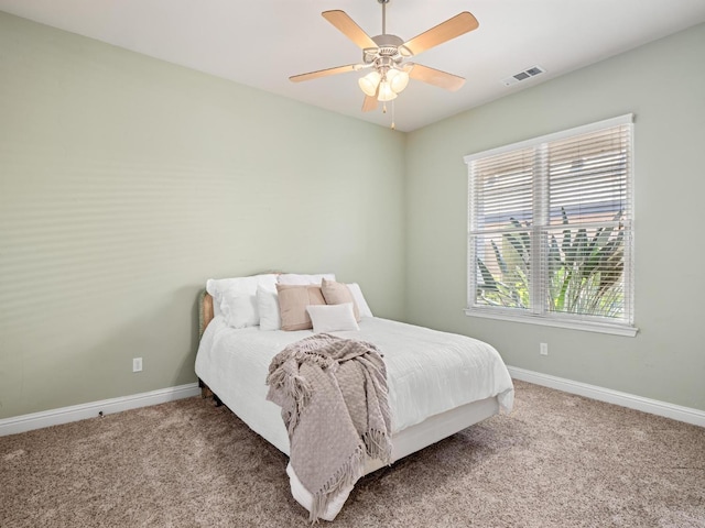 1568 E Sterling Hill Way, Fresno, CA 93730 - carpeted bedroom with baseboards and a ceiling fan