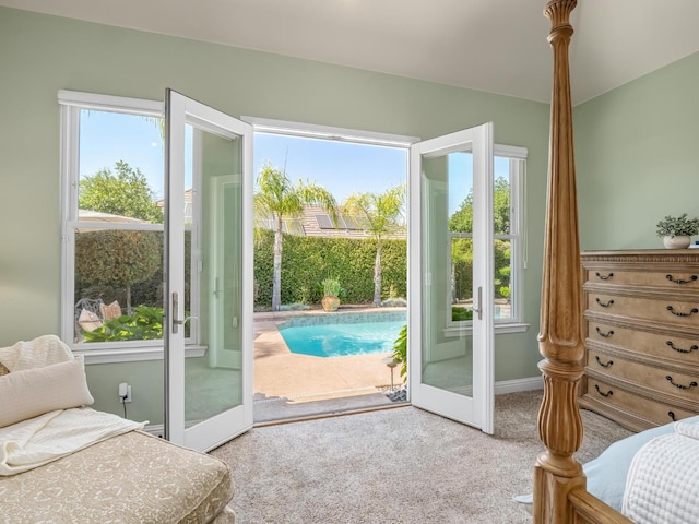 1568 E Sterling Hill Way, Fresno, CA 93730 - doorway to outside featuring carpet flooring and baseboards
