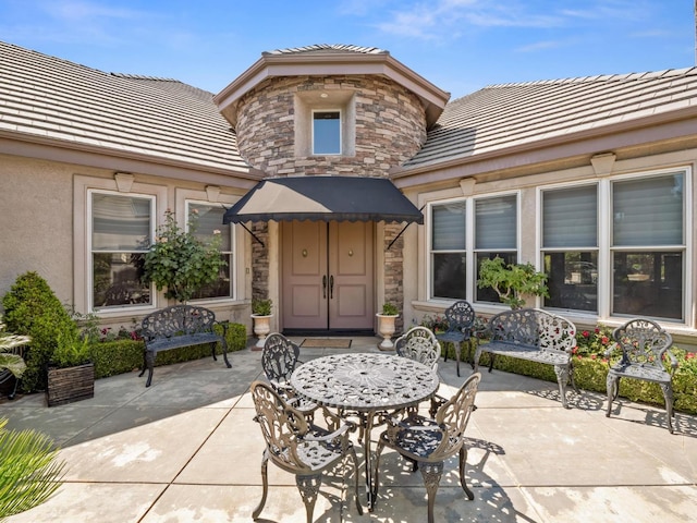 1568 E Sterling Hill Way, Fresno, CA 93730 - view of patio featuring outdoor dining space