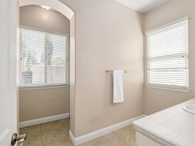 1568 E Sterling Hill Way, Fresno, CA 93730 - bathroom with plenty of natural light, tile patterned flooring, and vanity