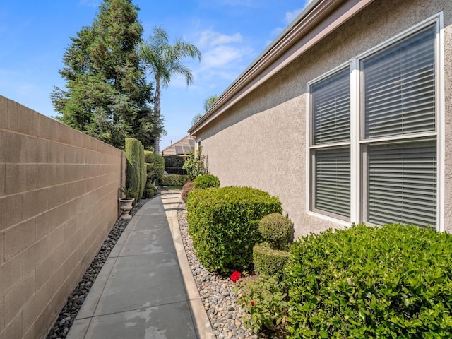 1568 E Sterling Hill Way, Fresno, CA 93730 - view of property exterior featuring stucco siding