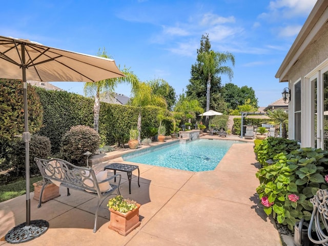 1568 E Sterling Hill Way, Fresno, CA 93730 - view of swimming pool featuring a patio area and a fenced backyard