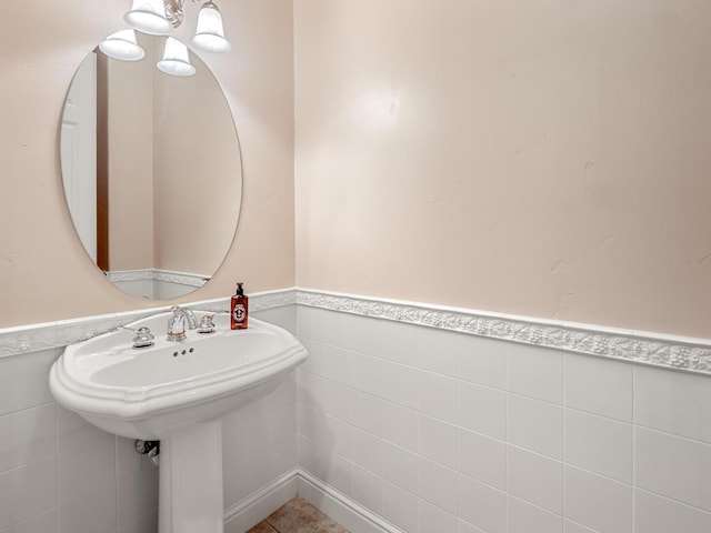 1568 E Sterling Hill Way, Fresno, CA 93730 - bathroom with wainscoting and tile walls
