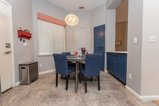 1774 Castle Way, Lemoore, CA 93245 - dining area with a chandelier and baseboards